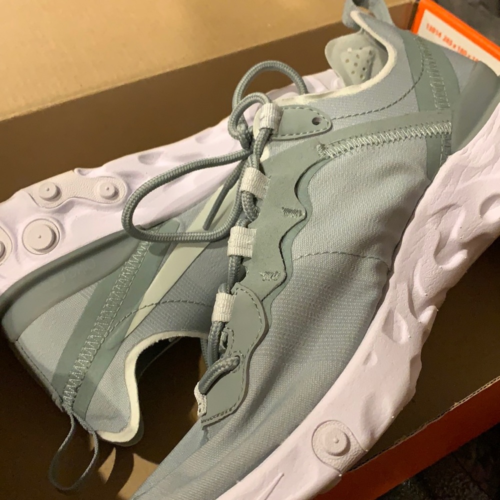 Mint-colored Nike sneakers
